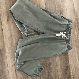 Washed denim maternity joggers.